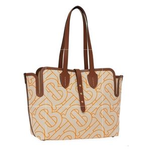 Burberry  shoulder bag/tote with a pouch.